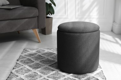 Stylish comfortable ottoman in room. Home design