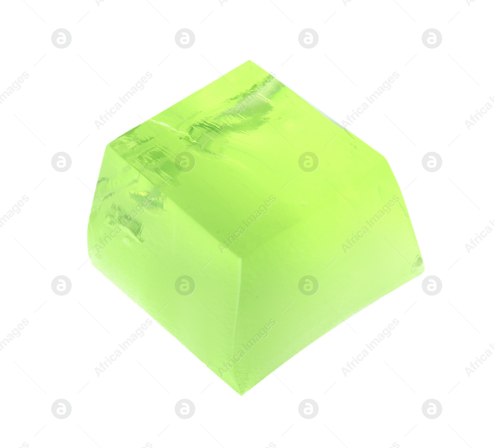 Photo of Delicious green jelly cube on white background