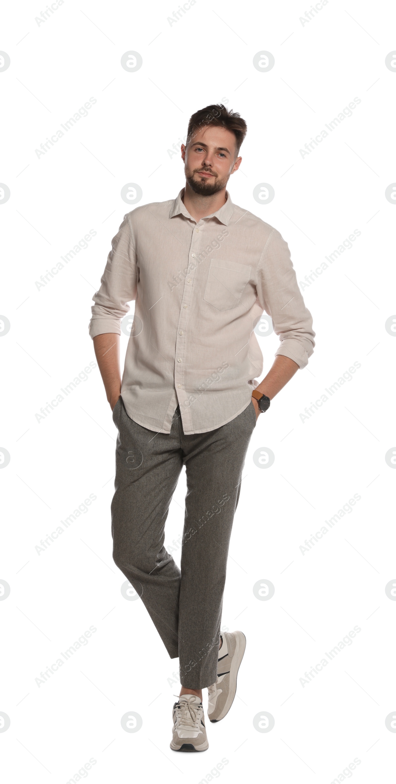 Photo of Full length portrait of handsome man on white background