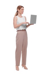 Beautiful happy businesswoman using laptop on white background