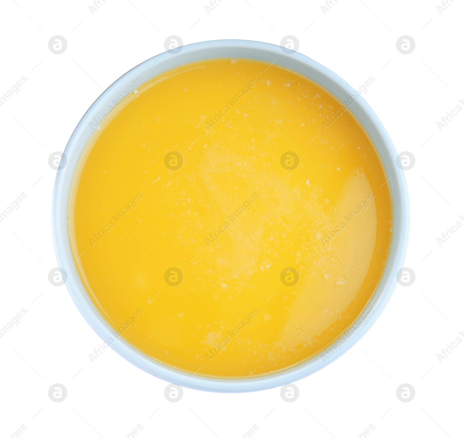Photo of Bowl of Ghee butter isolated on white, top view