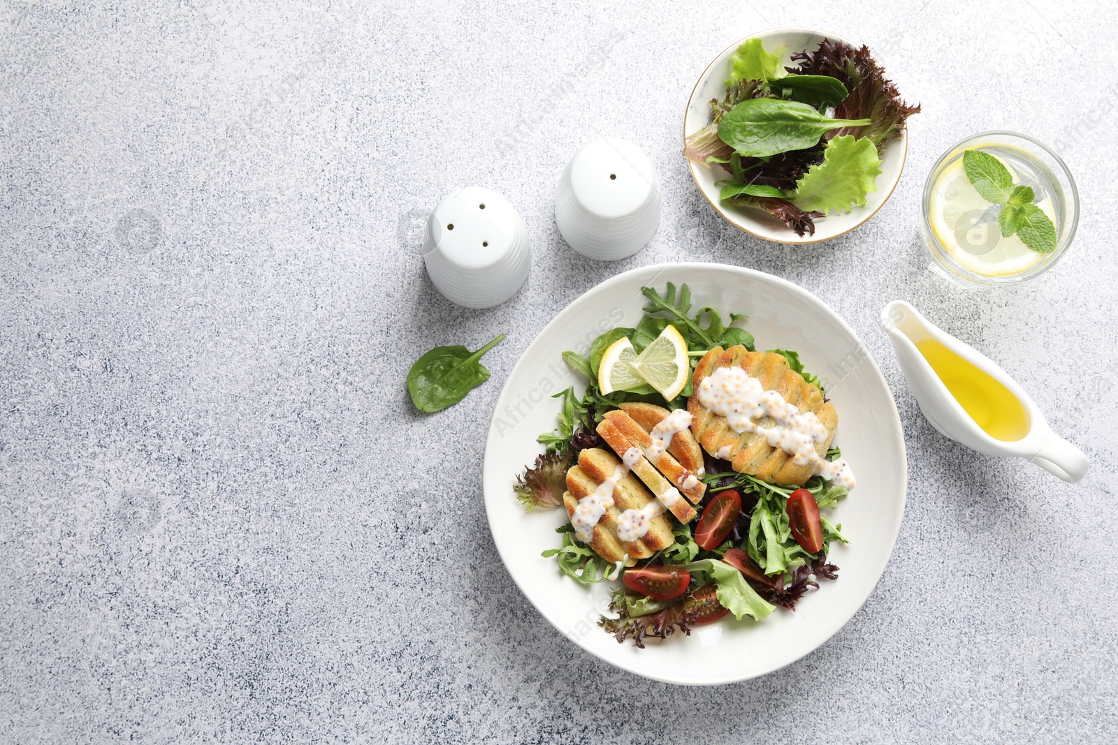 Photo of Flat lay composition with healthy dish high in vegetable fats on light textured table. Space for text