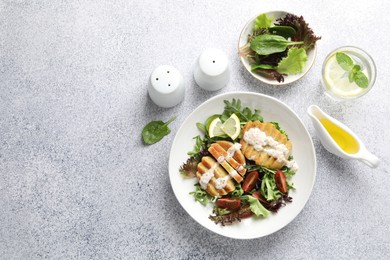 Flat lay composition with healthy dish high in vegetable fats on light textured table. Space for text