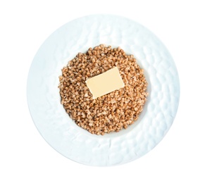 Photo of Plate of buckwheat porridge with butter isolated on white, top view