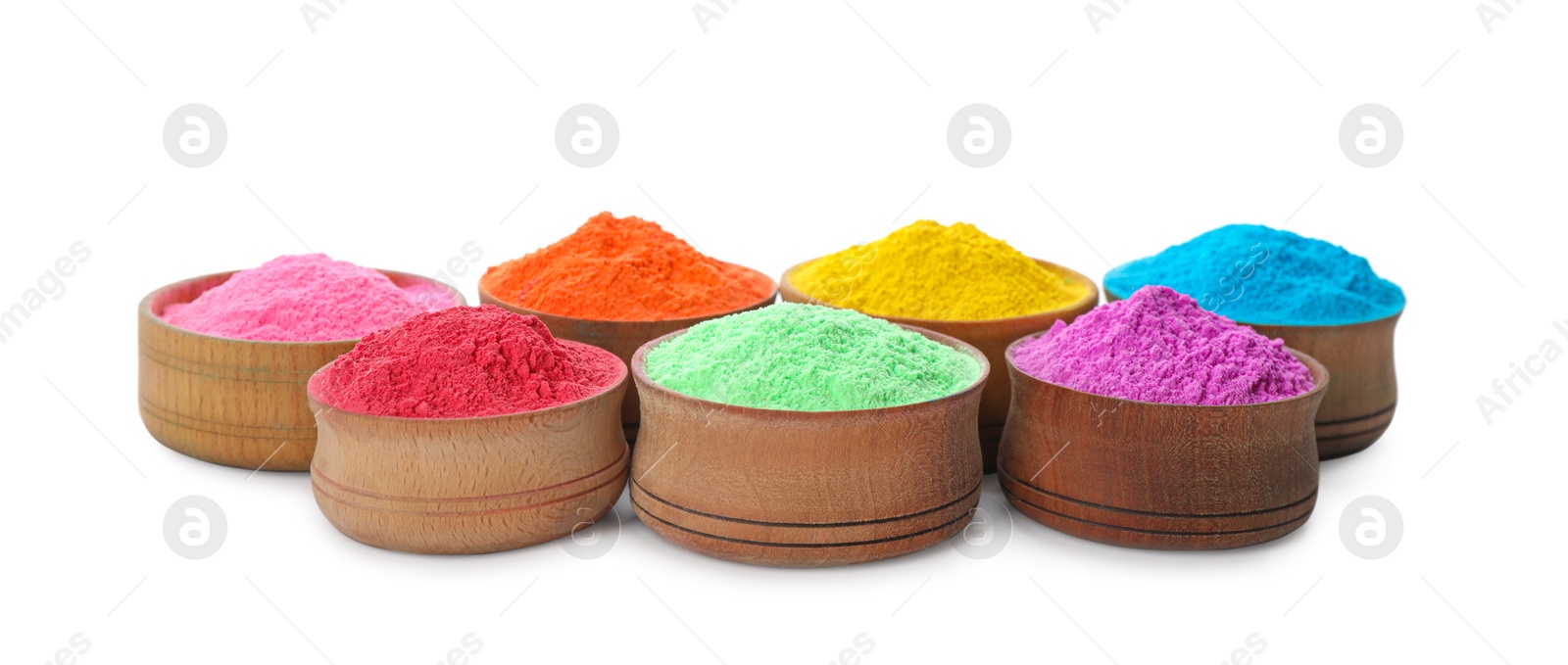 Photo of Colorful powder dyes in bowls on white background. Holi festival