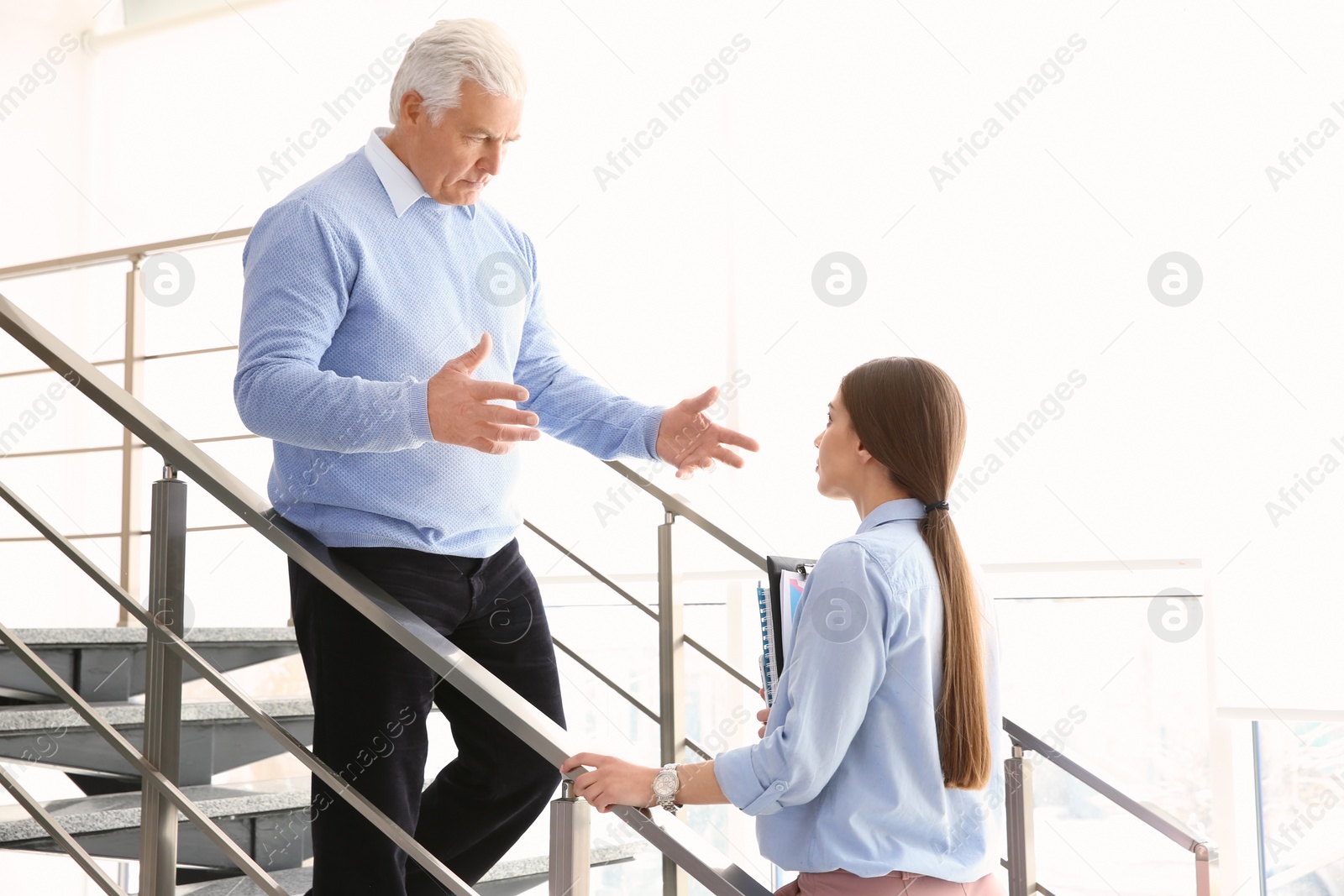 Photo of Office employees having argument at workplace