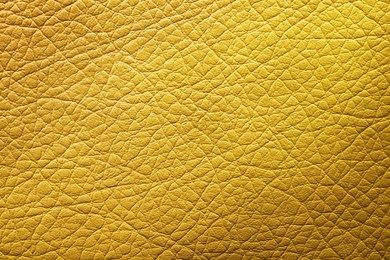 Image of Golden textured surface as background, closeup view