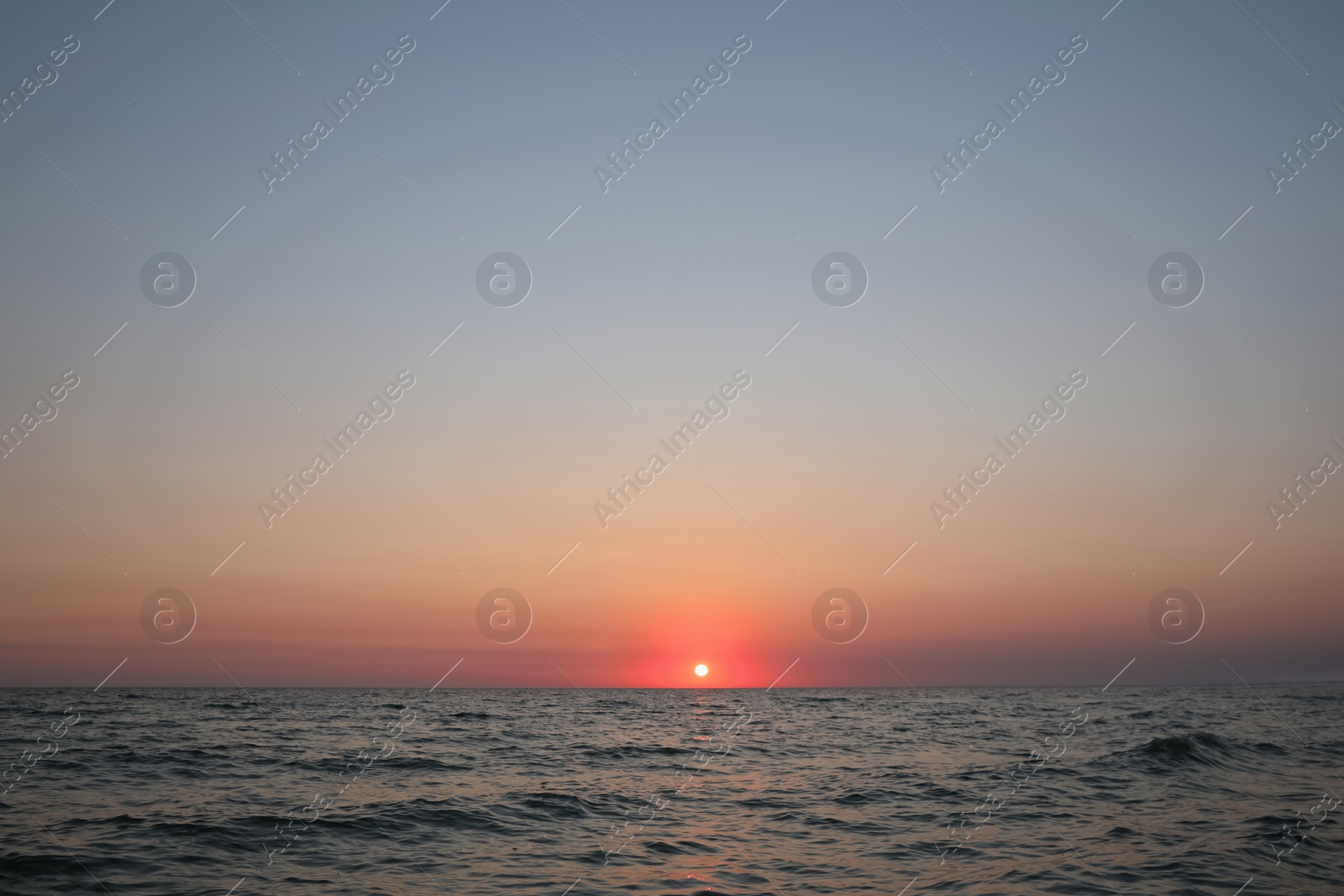 Photo of Picturesque view of beautiful sea at sunset