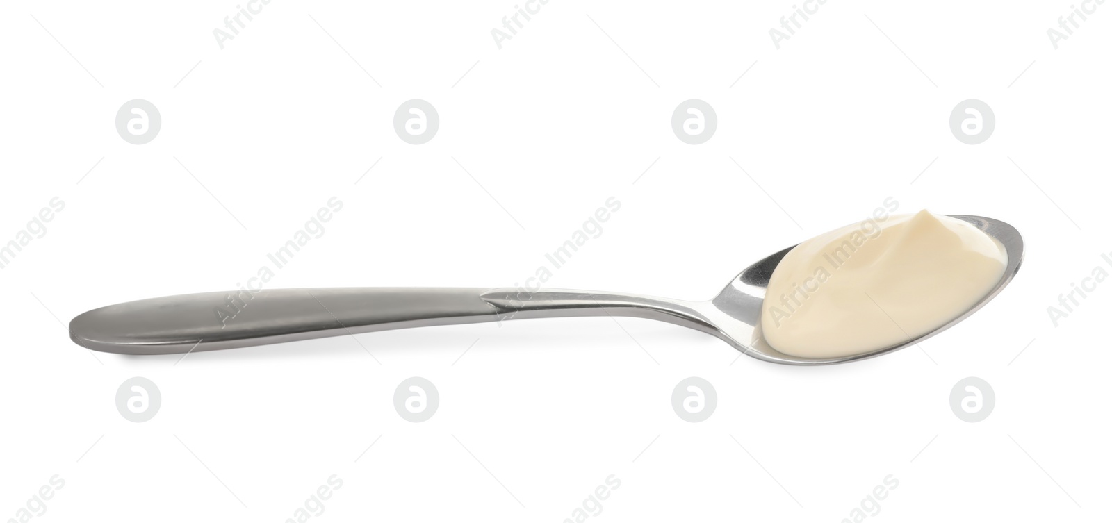 Photo of Metal spoon with mayonnaise isolated on white