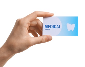 Woman holding business card isolated on white, closeup. Dental medical service