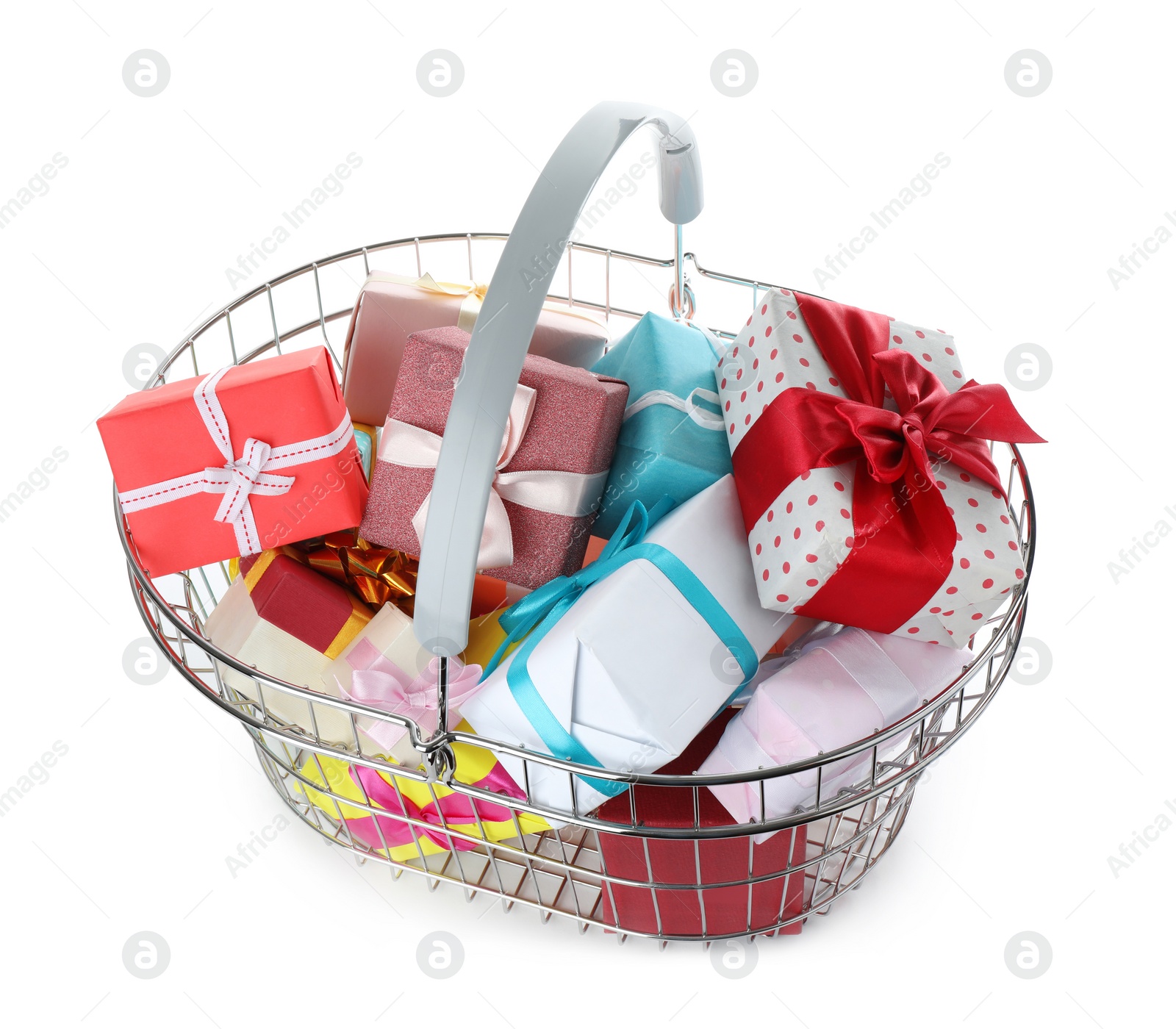 Photo of Shopping basket full of gift boxes on white background