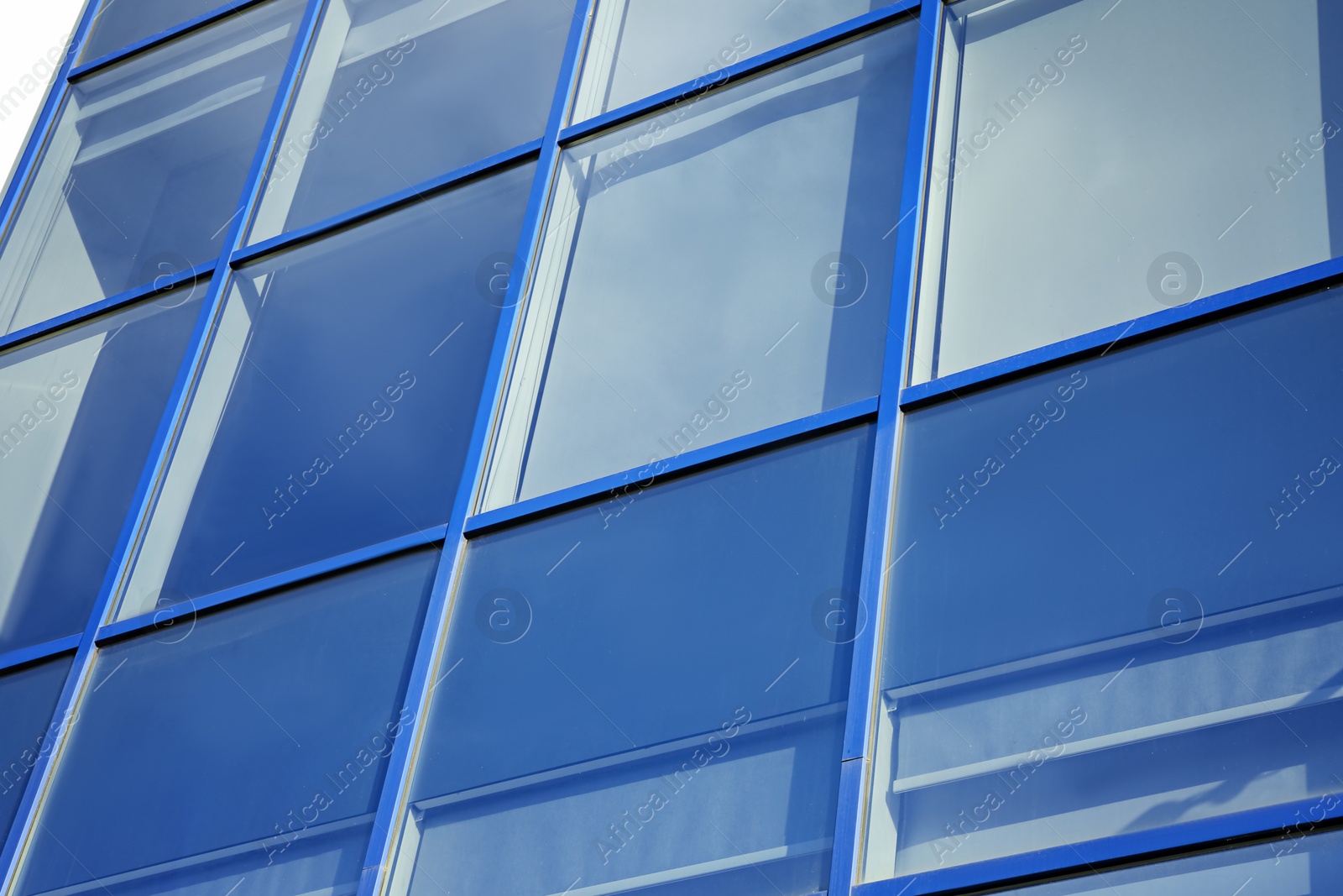 Photo of Modern office building with tinted windows. Urban architecture