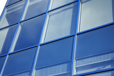 Photo of Modern office building with tinted windows. Urban architecture