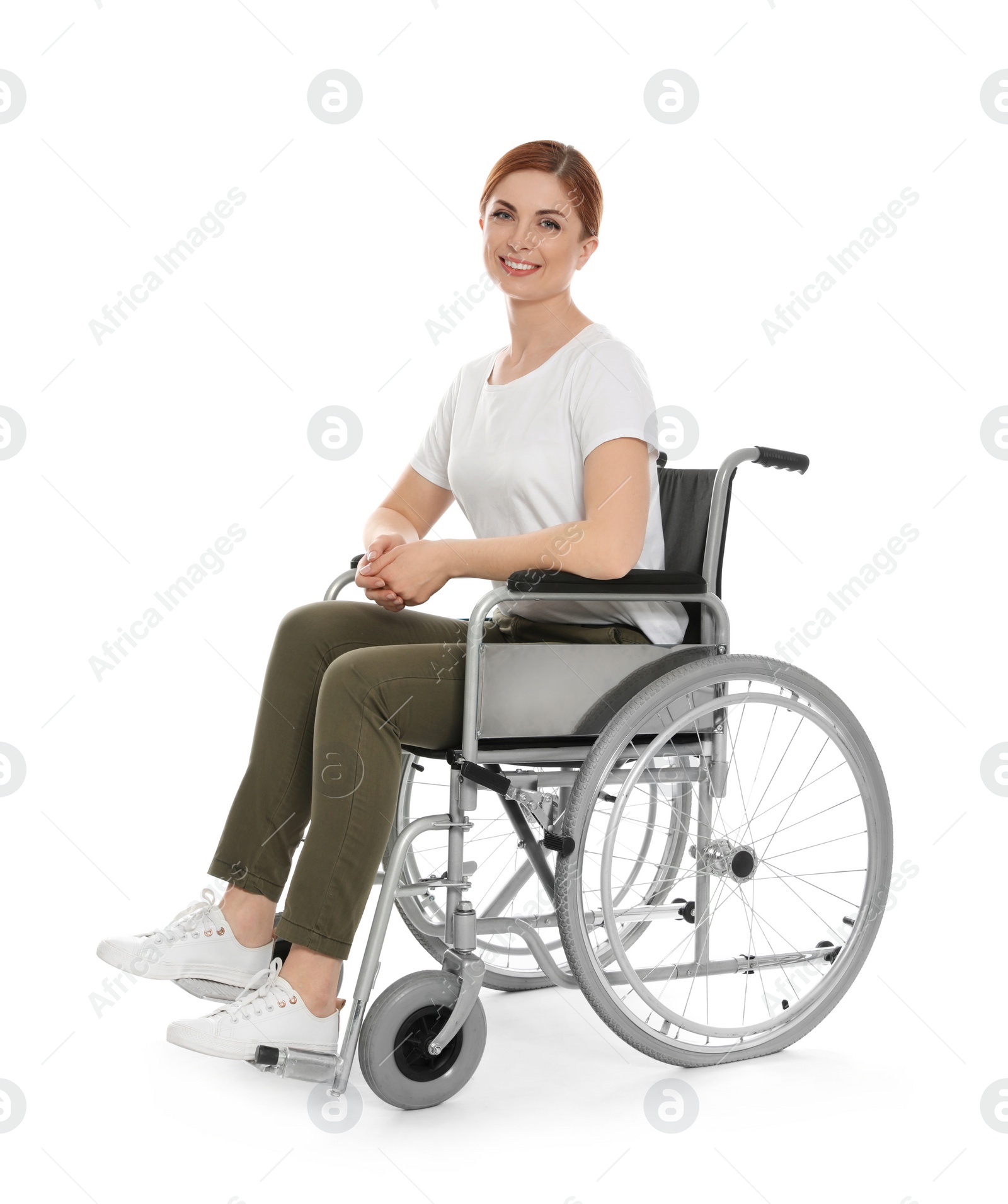 Photo of Beautiful woman in wheelchair isolated on white