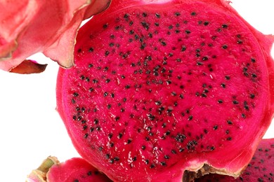 Delicious cut red pitahaya fruit on white background, closeup