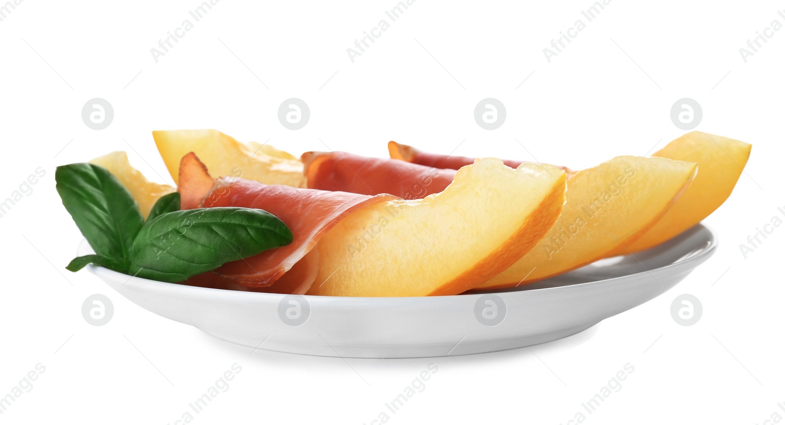 Photo of Plate with melon slices and prosciutto on white background