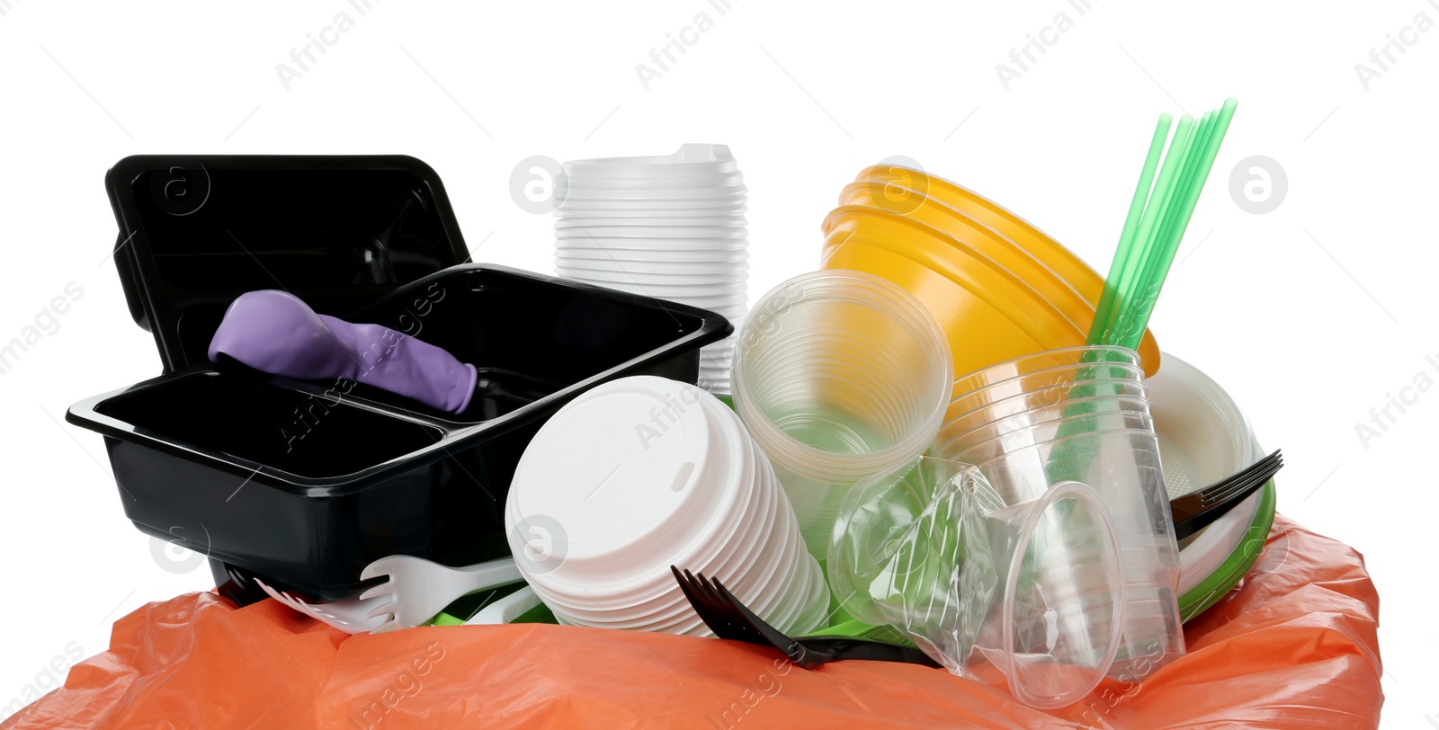 Photo of Pile of different plastic items on white background