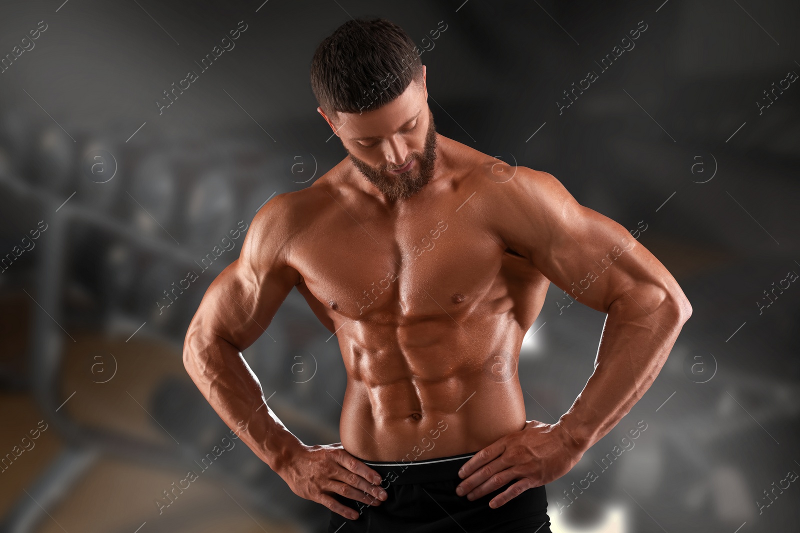 Image of Handsome bodybuilder with muscular body in gym