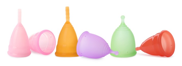 Image of Set with different menstrual cups on white background. Banner design