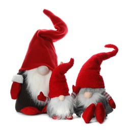 Photo of Funny Christmas gnomes on white background. Festive decor