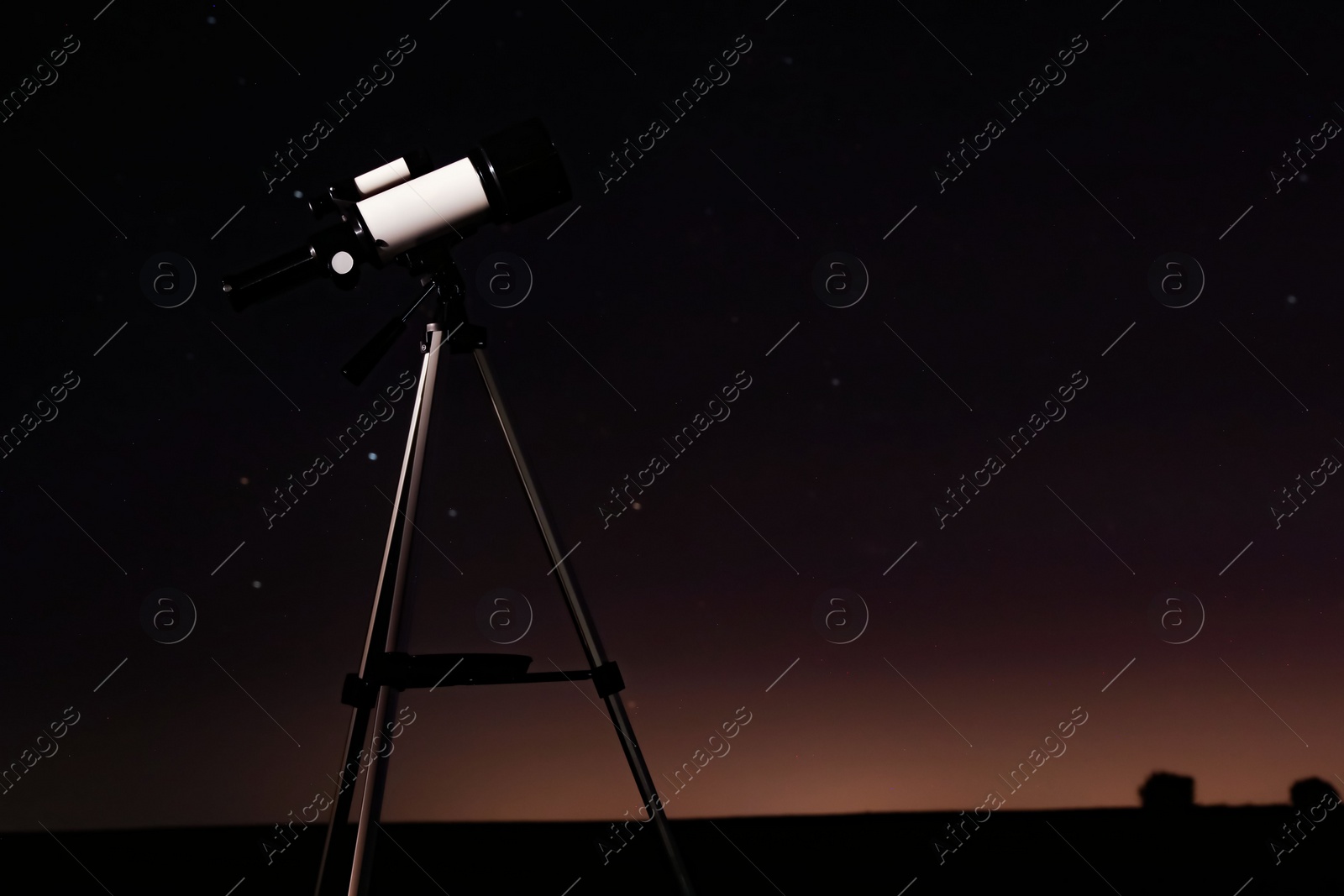 Photo of New astronomy telescope outdoors, space for text. Picturesque view of shiny stars at night