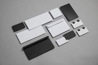 Composition with stationery on grey background. Mock up for design