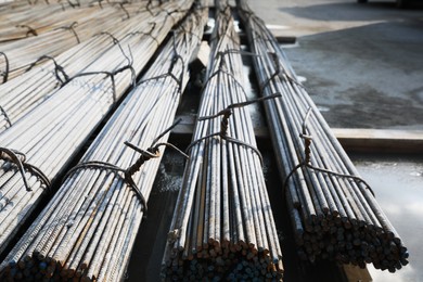 Photo of Many steel reinforcing bars on construction site
