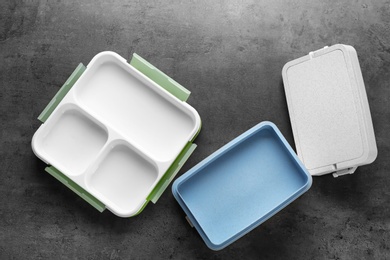 Photo of Empty lunch boxes on table, top view