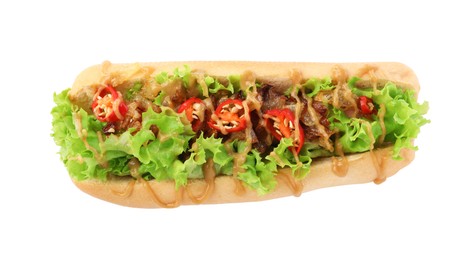 Photo of One tasty hot dog with chili, lettuce and sauce isolated on white, top view