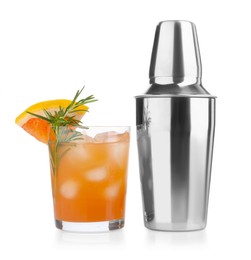 Photo of Metal shaker and delicious cocktail isolated on white