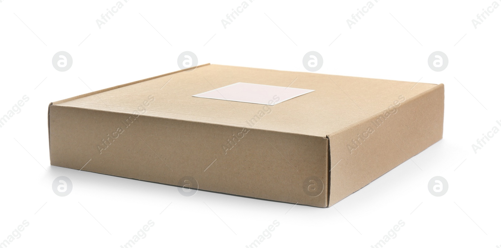 Photo of One closed cardboard box isolated on white