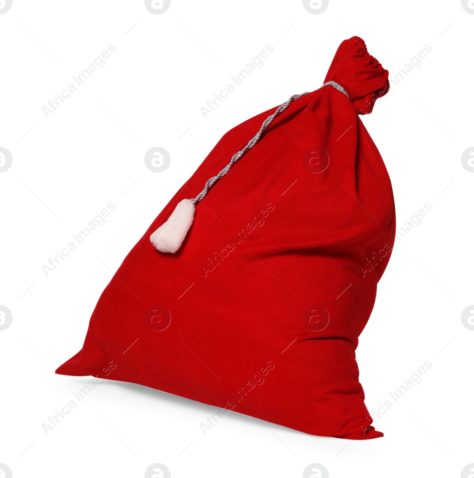 Photo of Merry Christmas. Santa Claus red bag isolated on white