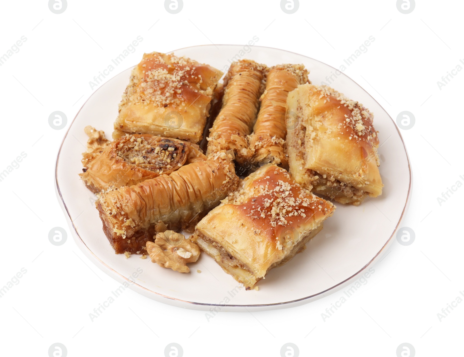 Photo of Eastern sweets. Pieces of tasty baklava isolated on white