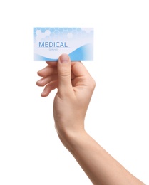 Photo of Woman holding business card isolated on white, closeup. Medical service