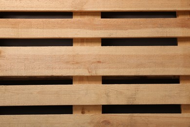 Wooden pallet as background, top view. Transportation and storage