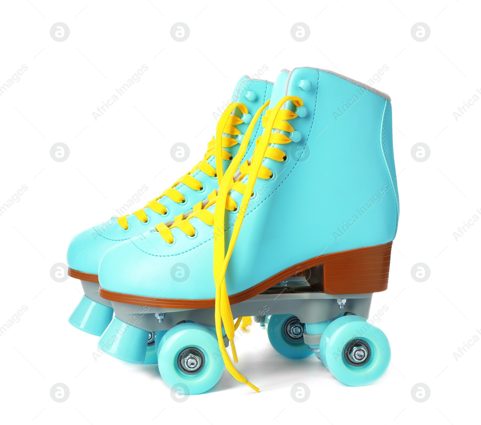 Photo of Pair of bright stylish roller skates on white background