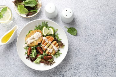 Photo of Flat lay composition with healthy dish high in vegetable fats on light textured table. Space for text