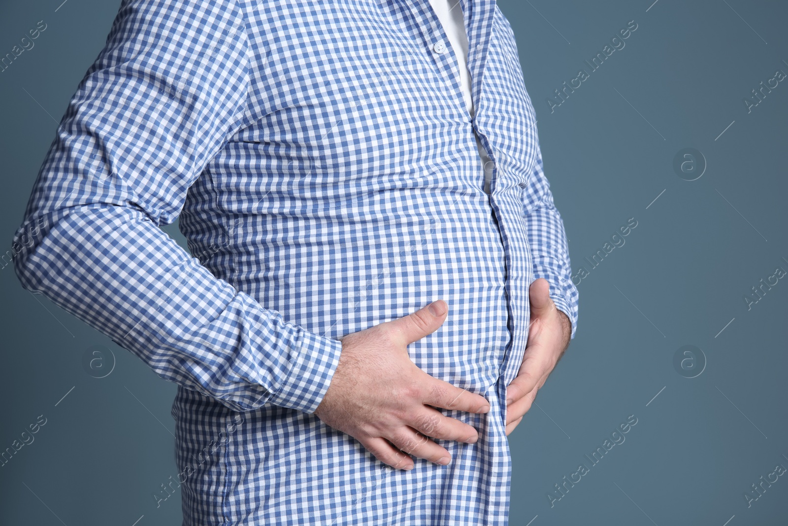 Photo of Overweight man on color background