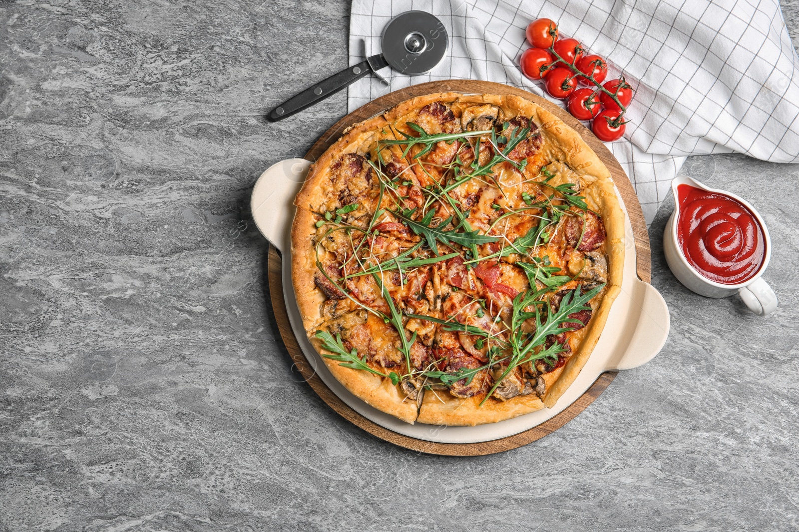 Photo of Flat lay composition with tasty homemade pizza and space for text on table