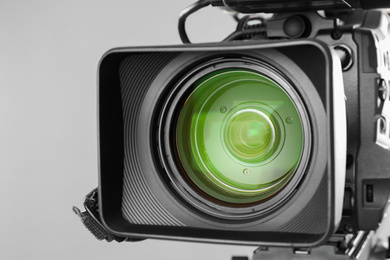 Photo of Professional video camera, closeup view of lens