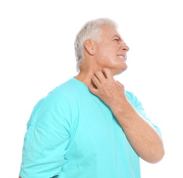 Mature man scratching neck on white background. Annoying itch