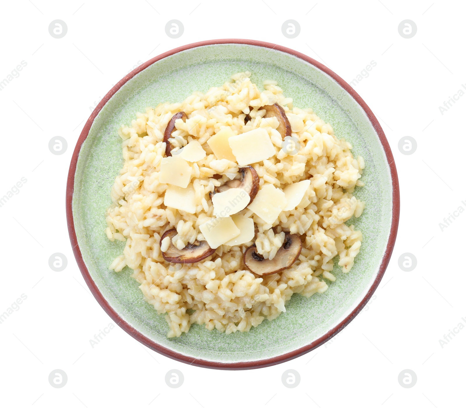 Photo of Delicious risotto with cheese and mushrooms isolated on white, top view