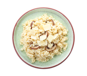Photo of Delicious risotto with cheese and mushrooms isolated on white, top view