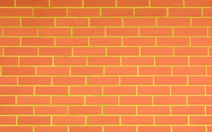 Texture of dark orange brick wall as background