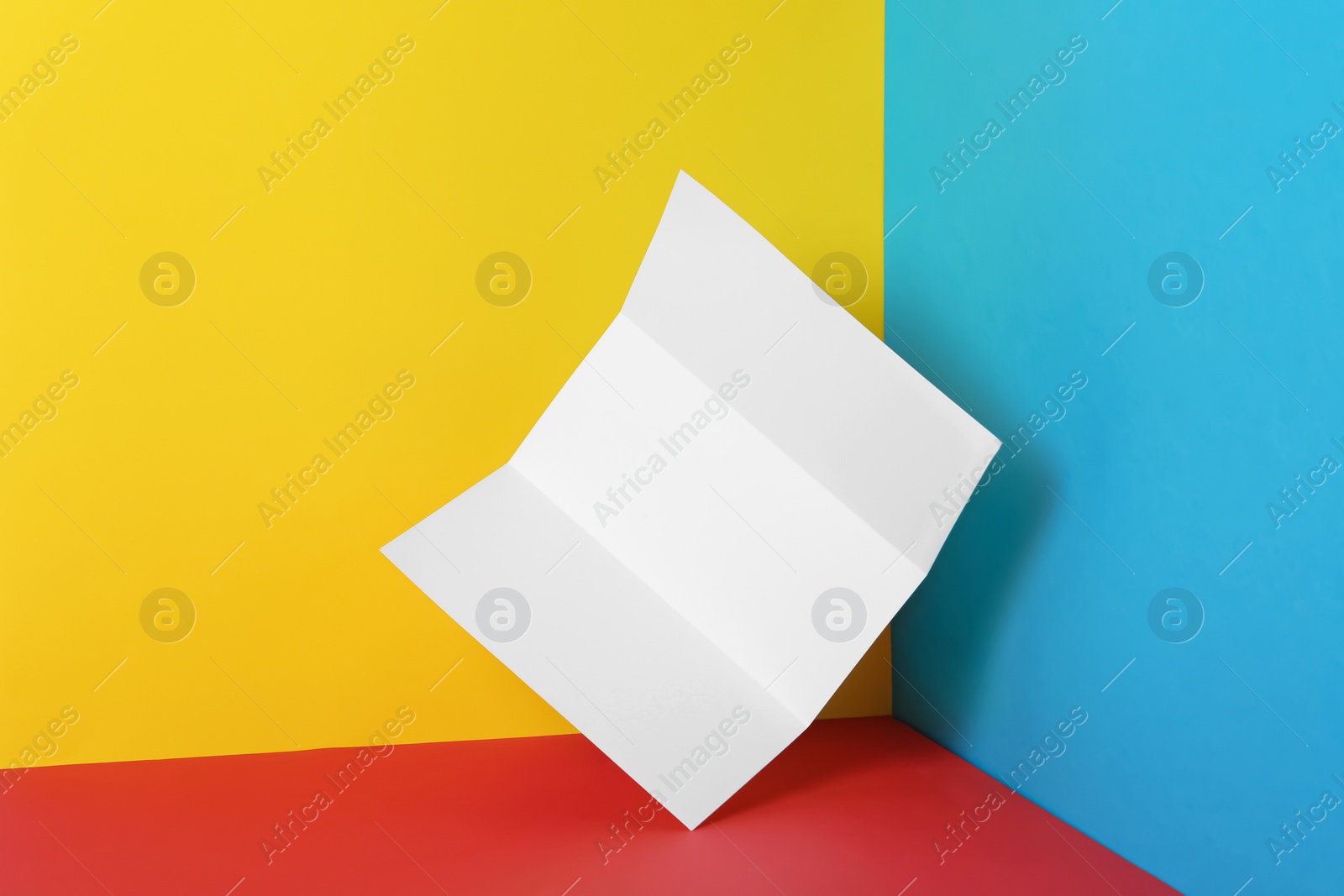 Photo of Empty flyer on color background. Mockup for design