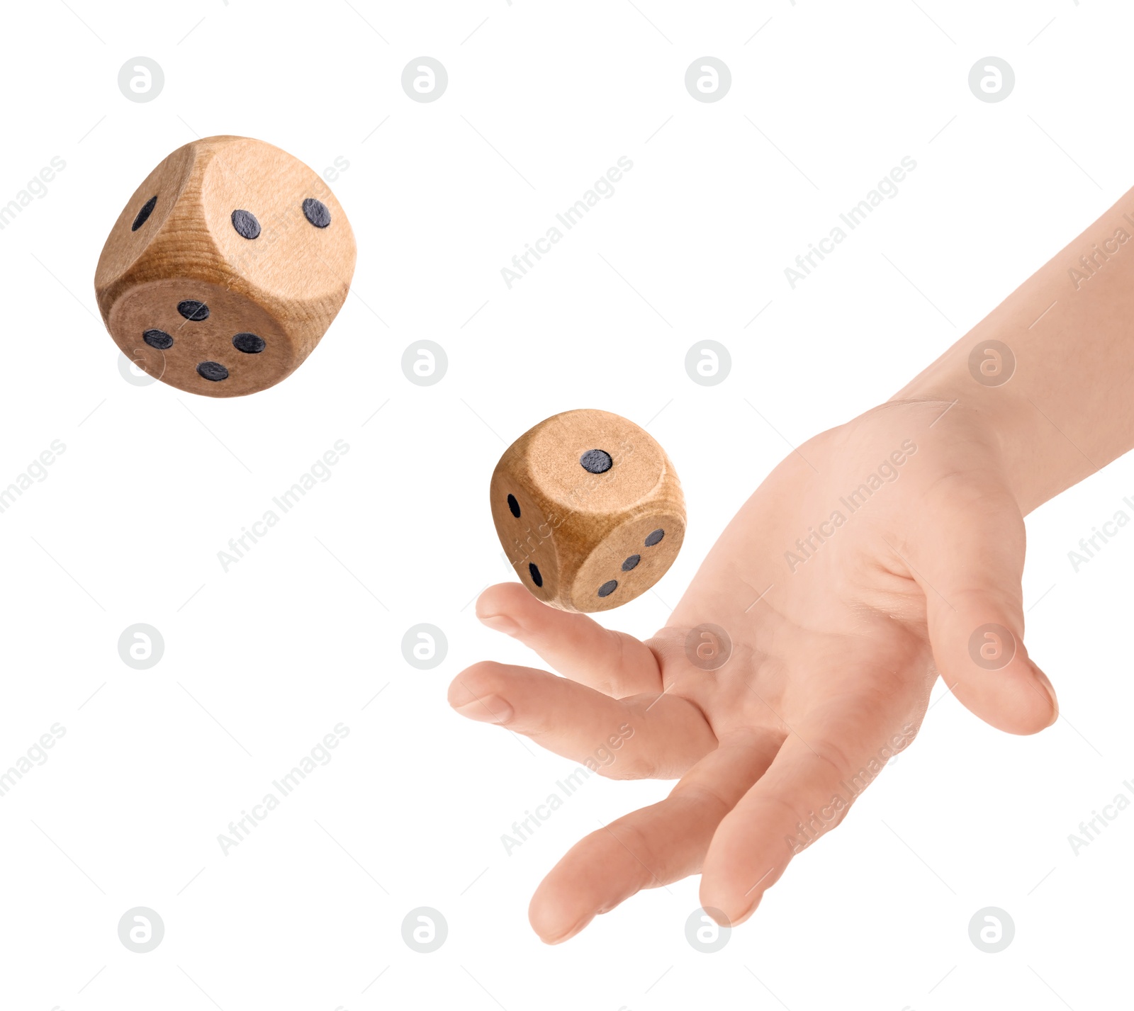 Image of Woman throwing wooden dice on white background, closeup