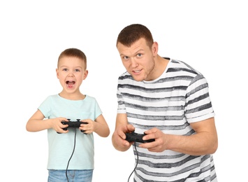 Happy dad and his son playing video games on white background. Father's day celebration