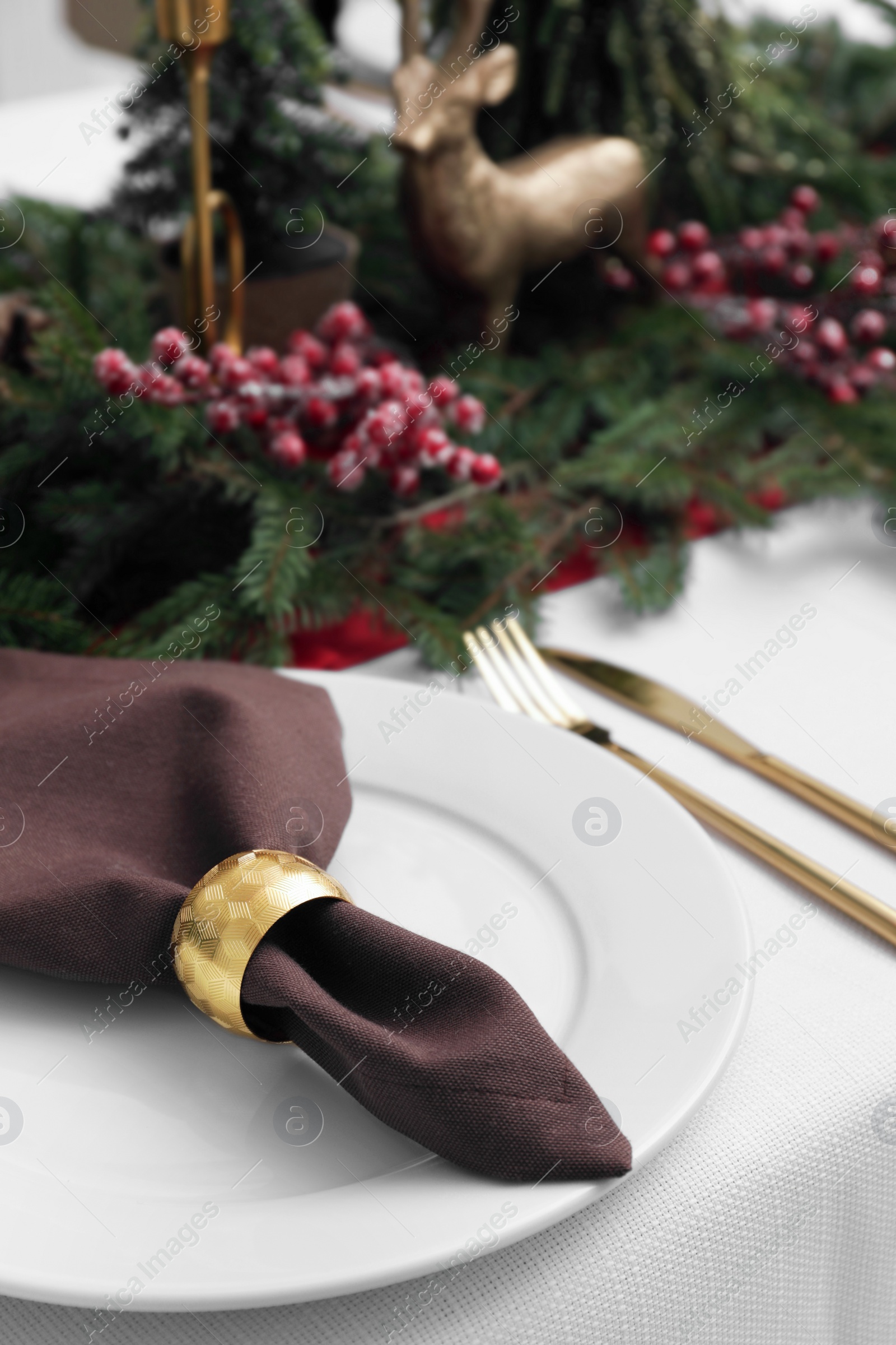 Photo of Beautiful festive table setting with Christmas decor