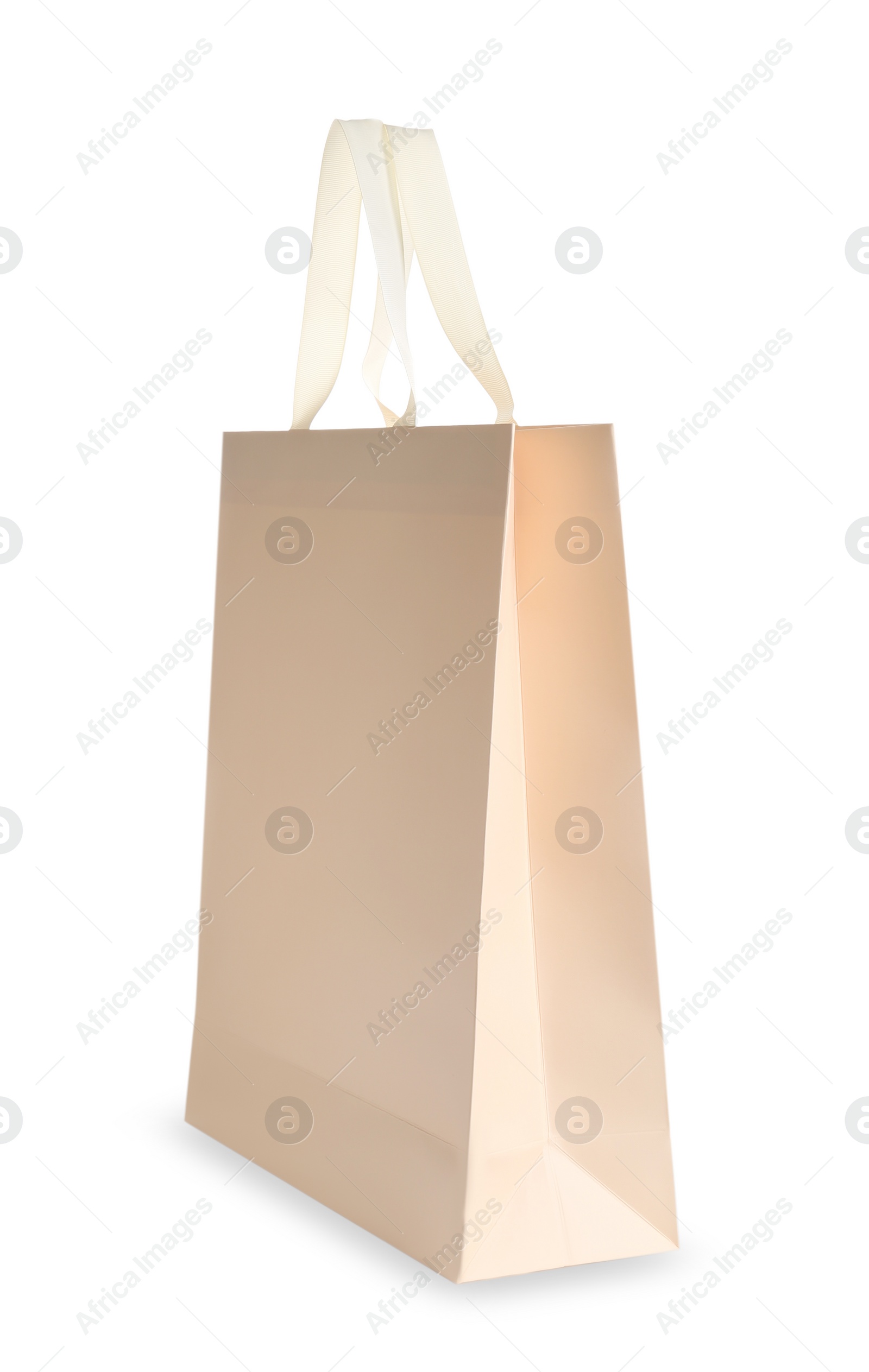 Photo of One paper bag isolated on white. Mockup for design