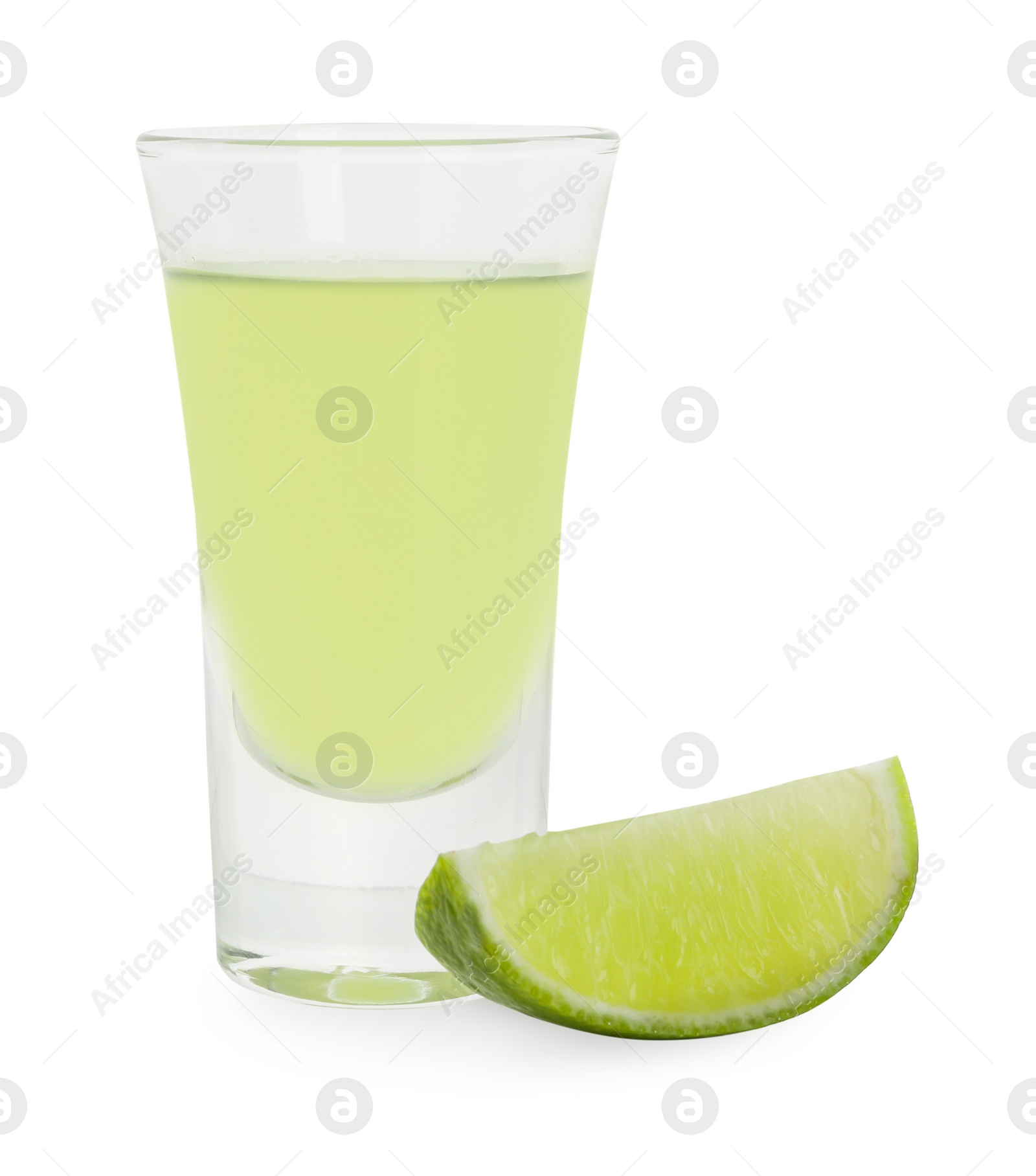 Photo of Shooter in shot glass and lime wedge isolated on white. Alcohol drink